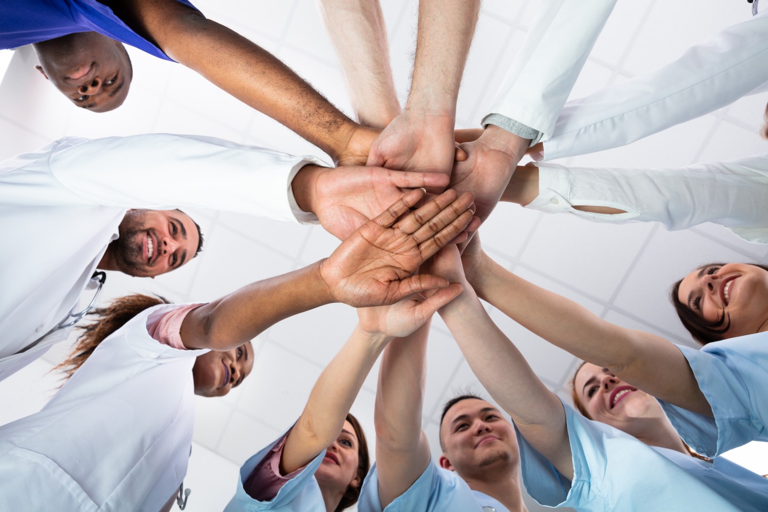 Employment - Team Photo, Hands In