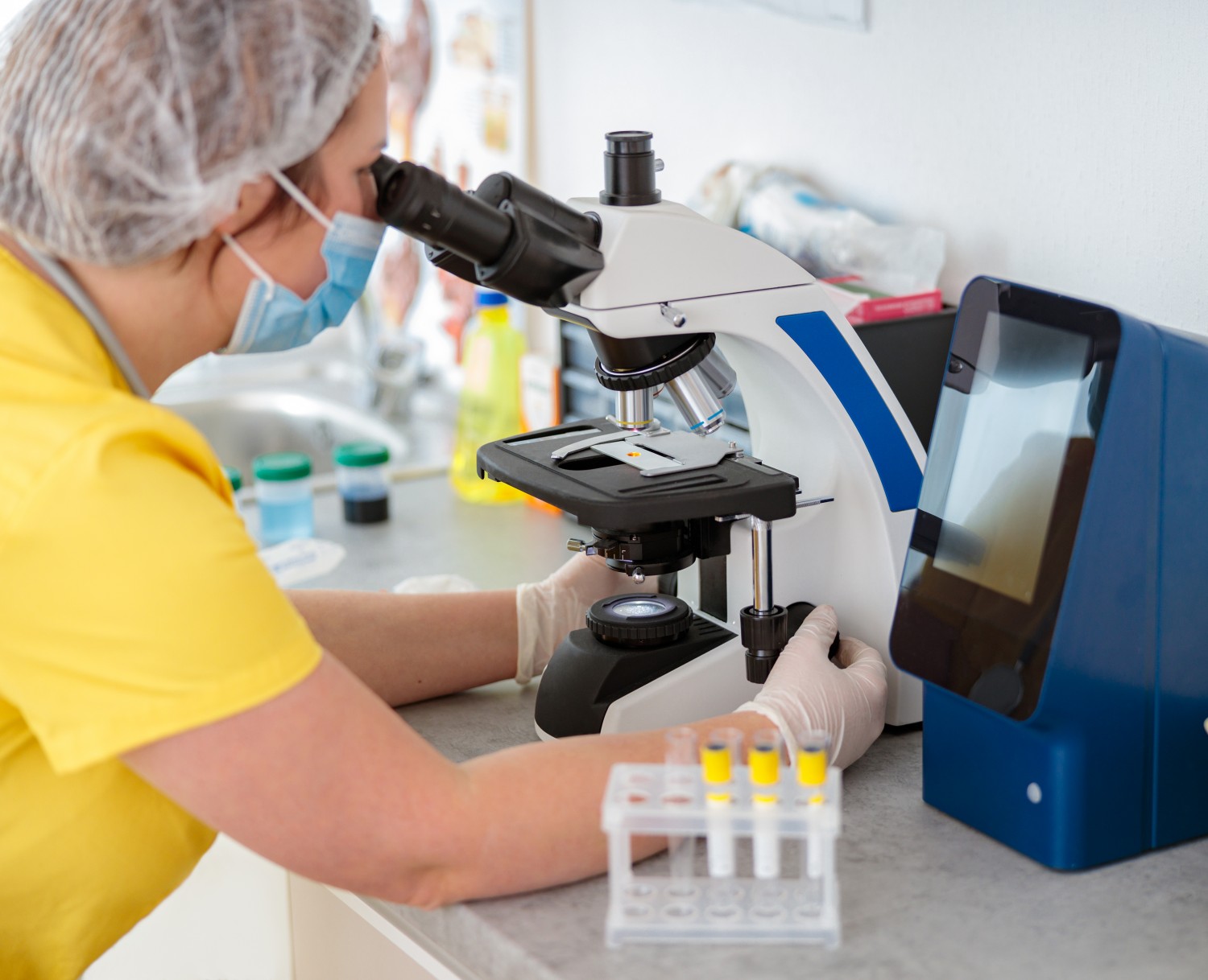 Laboratory - Staff looking in microscope